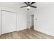 Bedroom featuring a closet with white doors and a doorway to another room at 3367 Spring Meadow Ct, Tucker, GA 30084