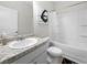 Bathroom featuring a vanity with a granite countertop and a shower-tub combination at 461 Charleston Pl, Villa Rica, GA 30180