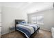 Comfortable bedroom featuring neutral walls, carpeted floor and bright natural light at 461 Charleston Pl, Villa Rica, GA 30180