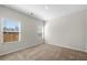 Well-lit bedroom with neutral carpet and two windows providing natural light at 461 Charleston Pl, Villa Rica, GA 30180