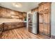 Well-equipped kitchen featuring wooden cabinets, stainless steel appliances, and ample counter space for meal preparation at 4722 Bexley Dr, Stone Mountain, GA 30083