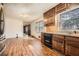 Bright kitchen with wood cabinets, modern appliances, and a window, creating a functional and inviting space for cooking at 4722 Bexley Dr, Stone Mountain, GA 30083