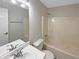 Full bathroom with a shower-tub combo and a large vanity with dual sinks at 521 Country Lake Dr, Mcdonough, GA 30252