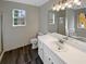 Bright bathroom features a soaking tub, shower, and modern vanity at 521 Country Lake Dr, Mcdonough, GA 30252