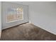 Bedroom with carpet flooring, neutral walls, and a window at 212 Riverstone Commons Cir, Canton, GA 30114