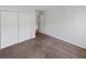 Bedroom featuring carpet flooring, neutral walls, and a closet at 212 Riverstone Commons Cir, Canton, GA 30114