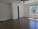 Large bedroom with gleaming floors, a ceiling fan, and natural light, offering a serene retreat at 2173 Montrose Sw Ave, Atlanta, GA 30311
