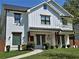 Charming two-story home with a landscaped yard and decorative accents at 2173 Montrose Sw Ave, Atlanta, GA 30311