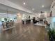 Spacious open-concept living area with hardwood floors and plenty of natural light at 2173 Montrose Sw Ave, Atlanta, GA 30311