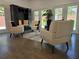 Cozy living room featuring stylish seating, modern decor, and natural light from sliding glass doors at 2173 Montrose Sw Ave, Atlanta, GA 30311