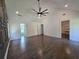 Spacious main bedroom with wood floors, ceiling fan, and ensuite bathroom and walk-in closet at 2173 Montrose Sw Ave, Atlanta, GA 30311