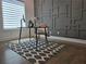 Modern home office featuring stylish geometric wall art, sleek desk, and plenty of natural light at 2173 Montrose Sw Ave, Atlanta, GA 30311