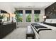 Main bedroom featuring an accent wall, natural light, and stylish furnishings at 405 Nix Ln, Lawrenceville, GA 30046