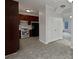 Classic kitchen featuring ample wood cabinets, white appliances, and tile backsplash at 483 Fairlane Nw Cir, Atlanta, GA 30331