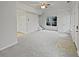 Well-lit living room featuring new carpeting and an entrance at 483 Fairlane Nw Cir, Atlanta, GA 30331