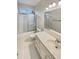 Clean bathroom featuring a shower-tub combo and white vanity at 4905 Ascot Nw Blf, Acworth, GA 30102