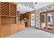Breakfast nook with access to a full kitchen, outdoor patio and a butler's pantry at 10625 Haynes Forest Dr, Alpharetta, GA 30022