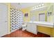 Bright bathroom with a long vanity, chevron shower curtain, and neutral color scheme at 2160 Carefree Cir # 9, Marietta, GA 30062