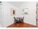 Cozy breakfast nook with wooden table, chairs, and view to the kitchen at 2160 Carefree Cir # 9, Marietta, GA 30062