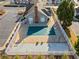 Aerial view of fenced community pool with a safety covering at 2160 Carefree Cir # 9, Marietta, GA 30062