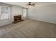 A spacious living room featuring a fireplace and large windows, ready for personalization and comfort at 2208 Howell Farms Nw Pt, Acworth, GA 30101