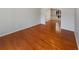 An open living room with hardwood floors and large windows at 2208 Howell Farms Nw Pt, Acworth, GA 30101