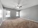 Large bedroom with carpet, natural light, and ceiling fan at 338 Thorn Thicket Dr, Rockmart, GA 30153