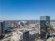 Stunning aerial view of the city featuring modern buildings and the stadium, all under a clear blue sky at 20 Marietta Nw St # 15D, Atlanta, GA 30303