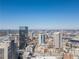 An aerial view showing a downtown cityscape with skyscrapers under a clear blue sky at 20 Marietta Nw St # 15D, Atlanta, GA 30303