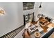 Open floor plan showing living, dining, kitchen, with outdoor patio and stairs to the second floor at 2626 Peachtree Nw Rd # 206, Atlanta, GA 30305