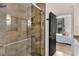 Contemporary bathroom shower with elegant tile work and convenient grab bar at 2626 Peachtree Nw Rd # 206, Atlanta, GA 30305