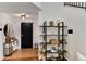 Stylish entryway with shelving, decor, and a view of the front door at 2626 Peachtree Nw Rd # 206, Atlanta, GA 30305