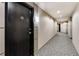 Well lit condo hallway with decorative carpet and unit 206 clearly labeled at 2626 Peachtree Nw Rd # 206, Atlanta, GA 30305