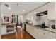 Bright kitchen boasting granite countertops, white cabinets, and stainless steel appliances at 2626 Peachtree Nw Rd # 206, Atlanta, GA 30305