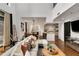 Inviting living room with a comfortable sectional, a dining area, and a modern kitchen at 2626 Peachtree Nw Rd # 206, Atlanta, GA 30305