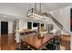 Spacious living area with dining, kitchen, living, and stairs to the second floor at 2626 Peachtree Nw Rd # 206, Atlanta, GA 30305