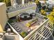 Expansive rooftop deck with lounge chairs, a spa and comfortable seating, perfect for entertaining or relaxing at 2626 Peachtree Nw Rd # 206, Atlanta, GA 30305