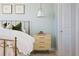 Cozy bedroom features soft colors, a decorative nightstand, and a comfortable bed, offering a tranquil space at 325 E Paces Ferry Ne Rd # 2005, Atlanta, GA 30305