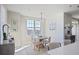 Sunlit dining area with modern decor, featuring a round table, comfortable seating, and stylish accents at 325 E Paces Ferry Ne Rd # 2005, Atlanta, GA 30305