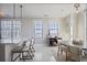 Bright dining area with modern barstools, wine bar, and a view to the city at 325 E Paces Ferry Ne Rd # 2005, Atlanta, GA 30305