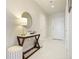 Inviting hallway with tile floors, stylish console table, and contemporary decor at 325 E Paces Ferry Ne Rd # 2005, Atlanta, GA 30305