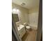 Bright bathroom with white fixtures, tiled floor, and shower-tub combo at 4351 Timberlake, Stone Mountain, GA 30083