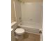 White tiled shower-tub combo and matching toilet at 4351 Timberlake, Stone Mountain, GA 30083