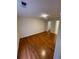 Bright bedroom with hardwood floors, neutral walls, and closet at 4351 Timberlake, Stone Mountain, GA 30083