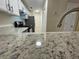 Well-lit kitchen featuring stainless steel appliances and white cabinets with granite countertops at 4351 Timberlake, Stone Mountain, GA 30083