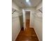 Walk-in closet with hardwood flooring and wire shelving at 4351 Timberlake, Stone Mountain, GA 30083