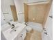 Tiled bathroom featuring a shower-over-tub, a large mirror, and a vanity at 5025 Skipping Stone Ct, Cumming, GA 30028