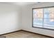 Bright bedroom with carpet and large window with blinds at 5589 Dendy Trace, Fairburn, GA 30213