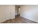 Empty bedroom with new flooring, neutral walls, and natural light at 8483 Magnolia Dr, Jonesboro, GA 30238