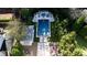 An aerial view of a private backyard oasis with a pool and fire pit at 115 17Th Ne St, Atlanta, GA 30309